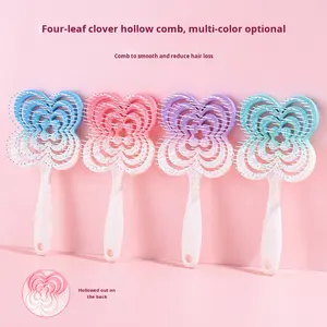 หวีม้วนยุงสำหรับเด็กผู้หญิงใหม่รูปใบโคลเวอร์แบบสี่แฉกพลาสติก ABS น้ำหนักเบาพกพาได้สำหรับนวดที่บ้าน - Product Image 2