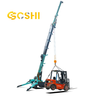 Grue araignée compacte de 5 tonnes avec stabilisateurs hydrauliques pour accès restreint et levage en intérieur