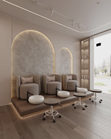 Fauteuil de pédicure en velours luxueux avec structure en métal doré, ensemble manucure-pédicure pour salon de beauté