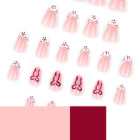 Faux ongles courts en forme d'amande, style Instagram européen et américain, minimalisme français, avec nœud rouge 3D, pour nail art
