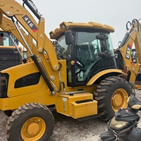 Chargeuse-pelleteuse CAT 416E d'origine en bon état avec une charge nominale de 7200 kg, une puissance de 75 kW, une pompe hydraulique et un moteur à vendre
