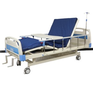 Cama de enfermería manual con doble manivela, altura ajustable, con respaldo y elevación de piernas para uso en el hogar o en la sala de estar. - Product Image 4