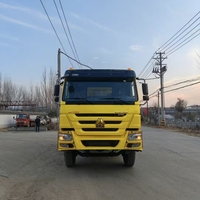 Дешевый подержанный самосвал SINOTRUK HOWO с правым рулем, 371 л.с., мощный тягач, строительный самосвал-дампер