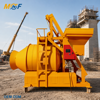 Bétonnière MHF 1300L à tambour, mélangeur de ciment avec élévateur à benne 50-60m³/h pour chantier de construction