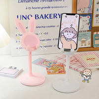 Le support de téléphone portable en forme de lapin mignon pour bureau, réglable et inclinable, avec poignée pour téléphone, accessoire de bureau.