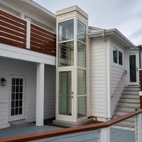 Fabricant de solutions élégantes pour ascenseurs résidentiels avec ascenseur domestique moderne à 3 étages et porte en verre pour maisons contemporaines