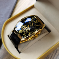 Montre mécanique automatique multifonctionnelle pour homme, style affaires simple et tendance, avec cadran ajouré, type barillet, bracelet en cuir, en alliage, vente en gros