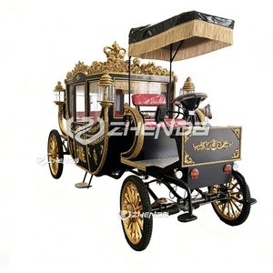 Calèche royale électrique de luxe noire dorée sculptée avec auvent à pompons et sièges doux rouges - Product Image 1