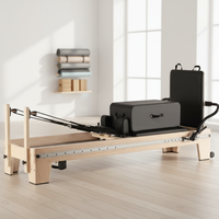 Appareil de Pilates haut de gamme personnalisable en bois d'érable avec résistance réglable, idéal pour les studios de Pilates, vente directe d'usine