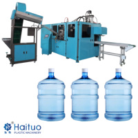 Machine de soufflage automatique de bouteilles d'eau PET 20L avec vanne haute pression PLC pour usine d'eau minérale et fabricant de barils en plastique
