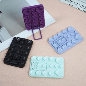 Soporte de Anillo Metálico Plegable Antideslizante con Ventosa de Silicona Oculta y Adhesivo Universal para la Parte Trasera de la Carcasa del Teléfono - Product Image 1