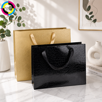 Sac en papier à motif crocodile avec poignées en corde torsadée, impression de logo personnalisée, pour l'emballage de marques de cosmétiques