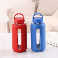 Bouteille d'eau isotherme en verre personnalisable de 400 ml avec graduations, manchon en silicone et poignées