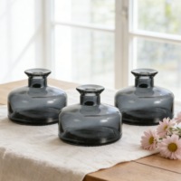 Bouteilles en verre rondes en gros pour flacons de parfum vides de 150 ml et 200 ml, avec remplissage de parfum en verre.