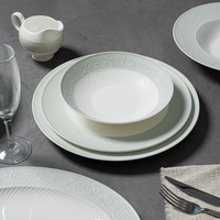 Assiettes de table haut de gamme en porcelaine fine vert menthe, motif floral en relief, personnalisables pour hôtels et restaurants (vente en gros)