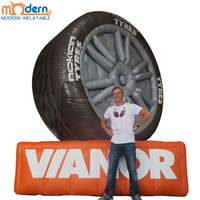Ballon publicitaire gonflable en tissu Oxford 210D conçu en usine sur mesure pour pneus de voiture Ventilateur intégré Couleur de taille personnalisable à vendre
