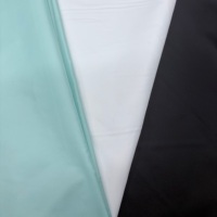 Couleur personnalisable, tissu 100% polyester, doux, taffetas 300T avec revêtement ciré pour la doublure des doudounes en hiver