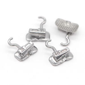 थोक दंत उत्पादों ऑर्थोडॉन्टिक वेल्डेबल बकल ट्यूब, धातु जाल आधार के साथ प्रथम/द्वितीय मोलर दंत ब्रेसिज़ - Product Image 1