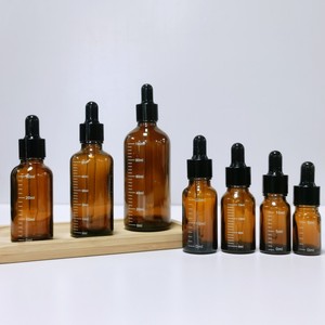 Wholesale Amber Round Glass <b>Dropper</b> <b>Bottles</b> 5ml-100ml (Including 20ml) for Essential Oil & Cosmetic Packaging with Easy Open End - Product Image 1