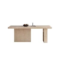 Table à manger contemporaine en travertin beige avec construction en pierre sans joint
