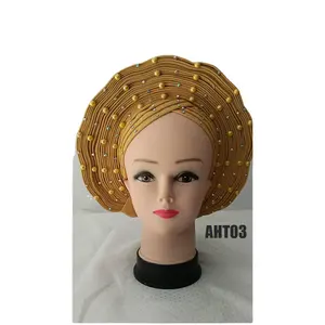 2023แฟชั่นทอง Aotogele แอฟริกัน Gele เน็คไทสำหรับงานแต่งงานแล้วสวมหมวกผู้หญิงสำหรับงานปาร์ตี้ราคาขายส่ง