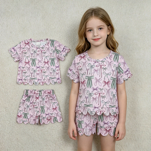 Nouvel ensemble décontracté pour filles : haut à manches courtes imprimé nœuds coquette et short festonné – Tenue 2 pièces d'été - Product Image 1