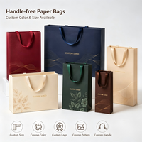 Sac cadeau en papier de luxe personnalisé avec poignée en ruban, sans pli central, sac en papier avec logo personnalisé pour l'emballage de souvenirs d'hôtel et d'hébergement touristique