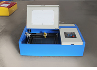 Mini máquina de grabado láser precio para sello de goma corte de papel grabado acrílico madera vidrio láser plotter impresora