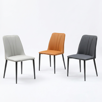 Chaise de salle à manger en cuir capitonnée Channel