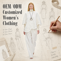 Chemisier ample en tissu tissé blanc vintage élégant avec broderie et ourlet festonné, manches larges, style cape poncho pour femme, vente en gros personnalisée