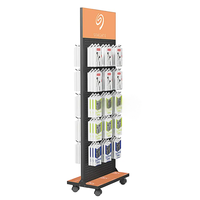 Présentoir mobile en métal à lattes pour accessoires de magasin, idéal pour un rangement pratique
