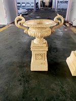 Grand pot à fleurs d'extérieur en fonte antique, effet rouillé