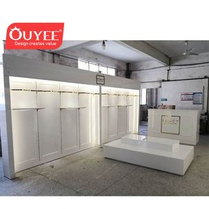 ตู้เสื้อผ้าไม้สีขาวสำหรับร้านขายเสื้อผ้ารูปแบบร้านขายเสื้อผ้าดีไซน์ทันสมัย - Product Image 5