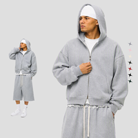 Ensemble streetwear hip-hop surdimensionné pour homme : sweat à capuche zippé coupe boxy et pantalon 3/4 déchiré