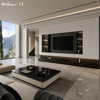 Meuble TV intégré au mur de style italien moderne et luxueux avec table basse assortie, système mural multimédia tout-en-un pour villa