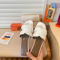 Sandales plates respirantes pour femmes, à bout rond, en cuir véritable, semelle extérieure en caoutchouc, à enfiler, confortables, à brides croisées, pour les soirées