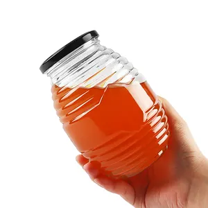China Supplier Wholesale 150g 250g 500g 1000g Honeycomb Shape Glass Honey Jars