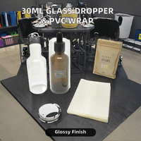 Flacon compte-gouttes en verre de 30ml 60ml avec enveloppe thermorétractable en PVC transparent Surface brillante Bandes rétractables perforées souples