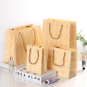 Sacs en papier gaufré couleur champagne pour la vente en gros, sacs cadeaux, sacs cadeaux de fêtes, sacs souvenirs et sacs cadeaux <span class=keywords><strong>s</strong></span>électionné<span class=keywords><strong>s</strong></span>. - Product Image 1