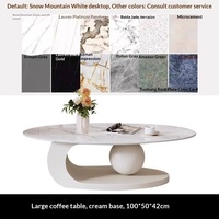 Table basse ovale moderne avec plateau en ardoise et structure en acier au carbone pour petits appartements et salons