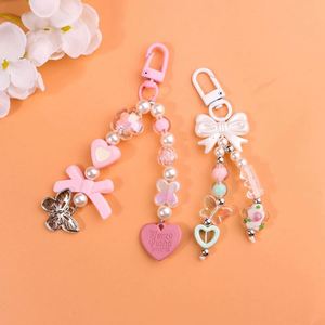 Llavero de moda para mujer con colgante creativo para teléfono móvil y cadena decorativa, estilo INS, novedoso y atractivo. - Product Image 3