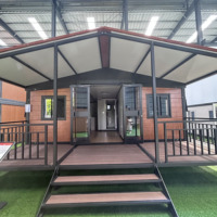 Fabricant direct chinois de maisons conteneurs pliables de 20 pieds, 2 chambres, salle de bain complète, plomberie/électricité préinstallées, villa modulaire miniature