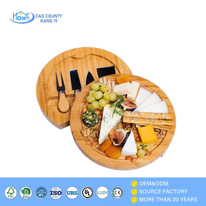 <span class=keywords><strong>Planche</strong></span> à <span class=keywords><strong>fromage</strong></span> ronde en bambou avec ensemble <span class=keywords><strong>de</strong></span> couteaux et tiroir coulissant, idéale pour les cuisines domestiques et les restaurants – Meilleure vente - Product Image 1