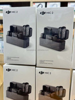 Microphone sans fil DJI Mic 2 (2 émetteurs + 1 récepteur + étui de charge) Émetteur-récepteur Étui de charge Haut-parleur Microphone Mic2 DJI Mic 2