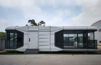 Maisonnette de luxe moderne en structure acier, portable, type caravane, écologique, installation facile pour appartement et cour.