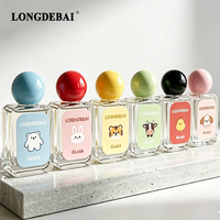Botol Parfum Kaca Mini Murah Pabrik 30ml 50ml 100ml Botol Parfum Bulat Transparan Kosong dengan Pompa Semprot dan Tutup Bola Berwarna
