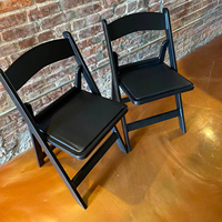 Chaise pliante en résine noire pour terrasse, balcon, hôtel, magasin de proximité, empilable, portable, prix de gros