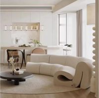 Canapé moderne italien minimaliste à effet d'ondulation, canapé en tissu velours d'agneau incurvé de luxe léger pour villa ou appartement