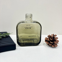 Nouvel Arrivage Fabricants Vente en Gros Bouteilles en Verre Plat Blanc Éclatant de 250 ml Contenants Vides pour Huiles d'Aromathérapie Sans Flamme