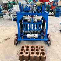 Machine de moulage de briques non automatique à faible consommation d'effort 4-40A pour la production de matériaux de construction avec rapport d'essai fourni